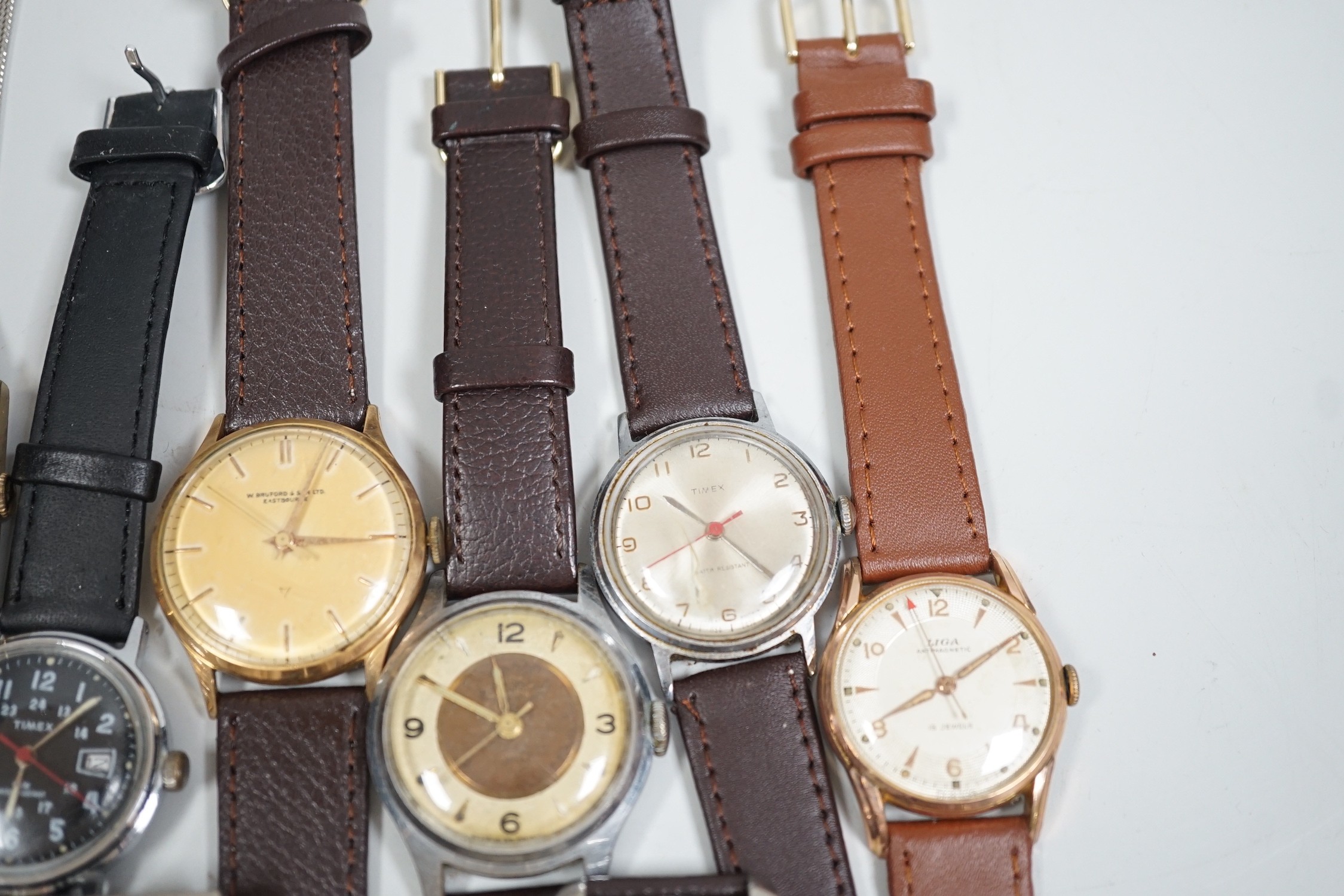 A collection of twelve assorted mainly gentleman's wrist watches, including Cyma, Sekonda and Timex.